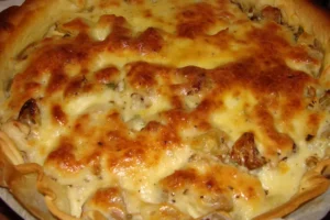 Préparez facilement ce plat de consistant de Quiche au Thon, Oignons et Pomme de Terre grâce à des instructions simples dans la vidéo ci-dessous.